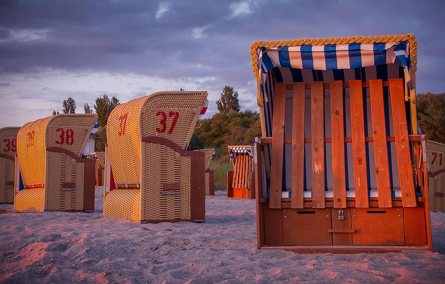 sunset, beach chair, clouds, sea, north sea, sand, coast, sky HD wallpaper