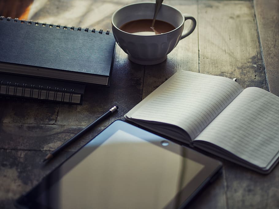 white ceramic mug beside open notebook, diary, ipad, write HD wallpaper