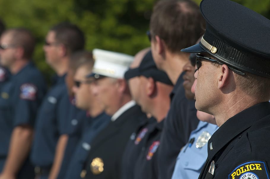 police officers standing in line during daytime, uniform, cop