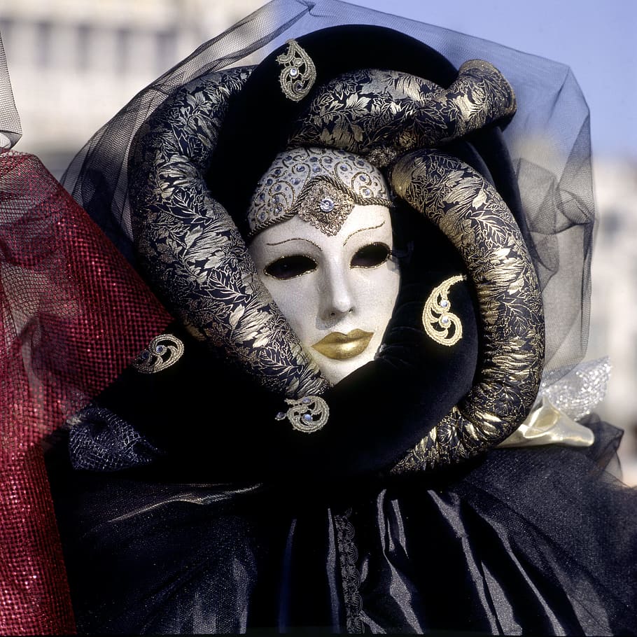 volto mask in shallow focus photography, venice, carnival, italy