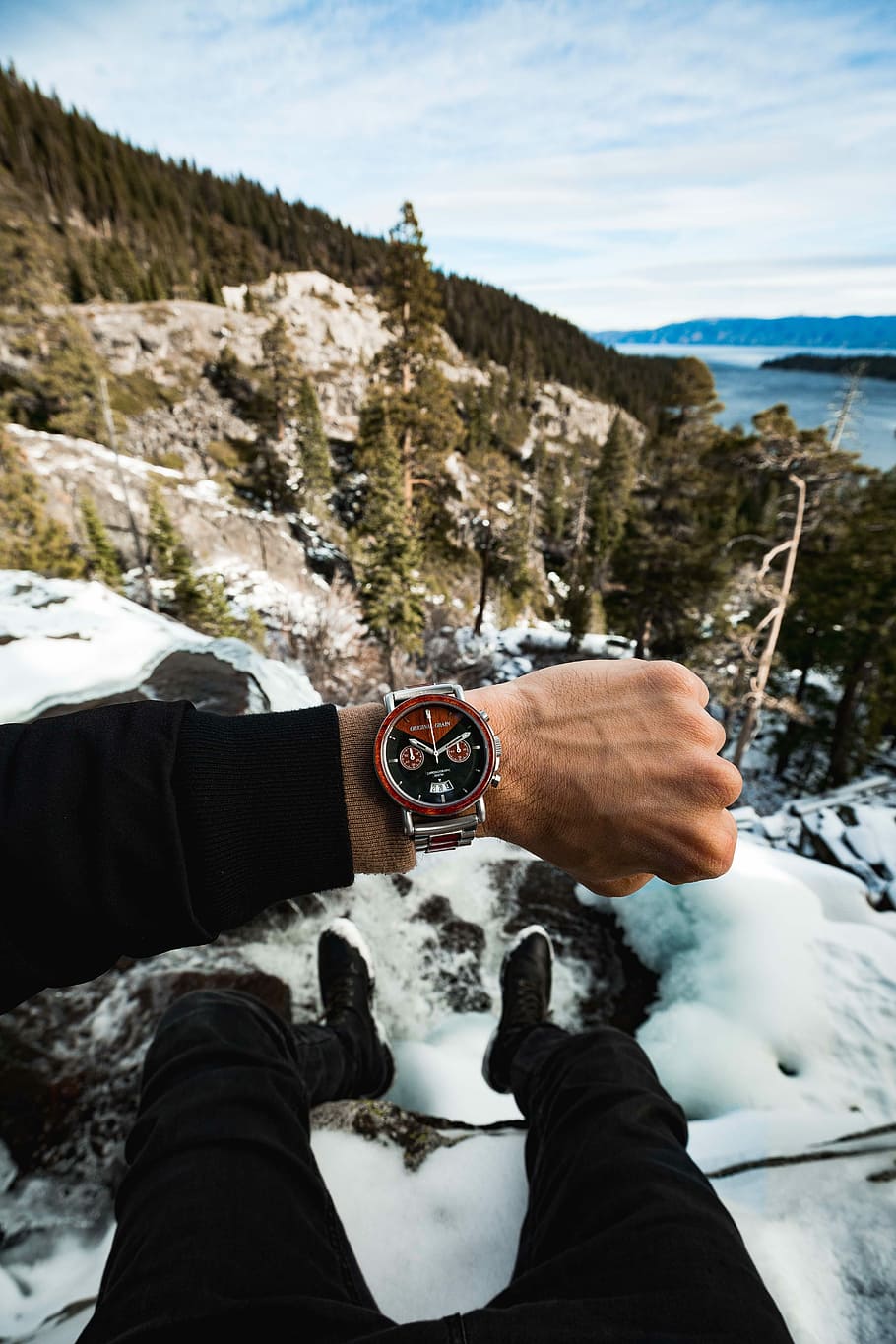 person wearing chronograph watch on top of mountain, person showing chronograph watch HD wallpaper