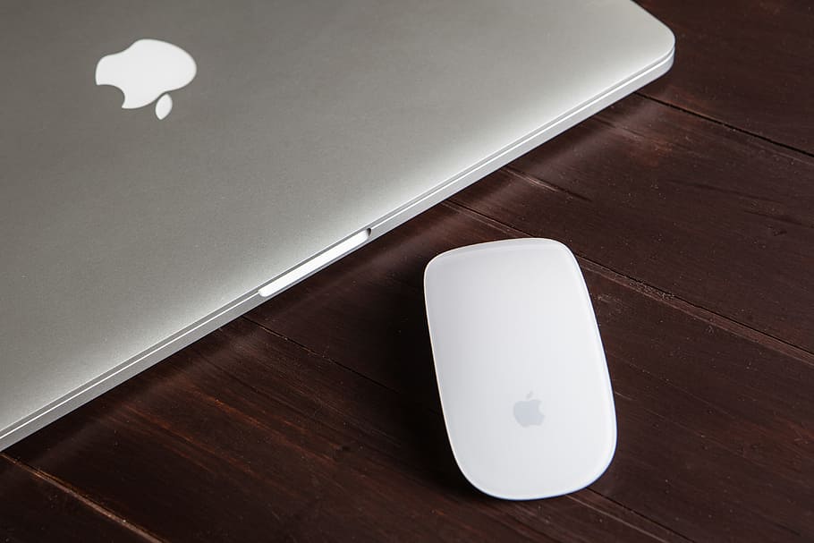 Close-up shot of a Macbook Pro and Magic Mouse on a wooden desk, image captured with a Canon 5D DSLR, HD wallpaper