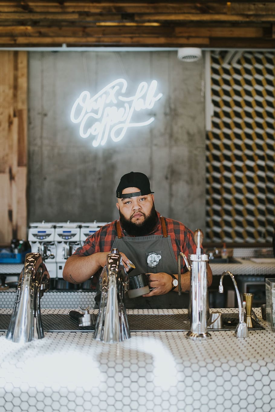 man holding coffee mug beside counter, people, bartender, restaurant HD wallpaper