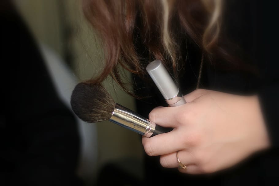 woman holding black and brown makeup brush, brushes, make-up HD wallpaper