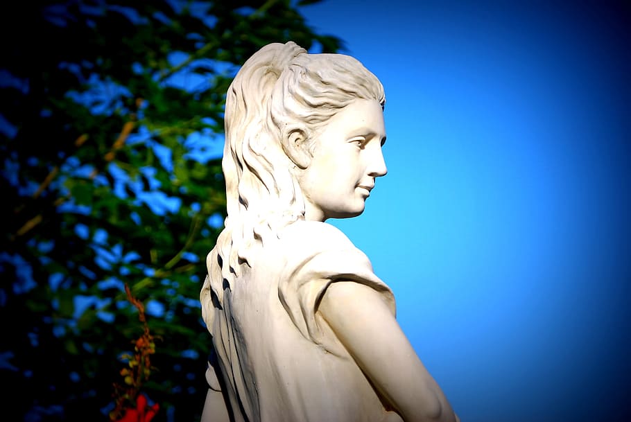 woman concrete statue near tree, goddess, beauty, roman, stone sculpture
