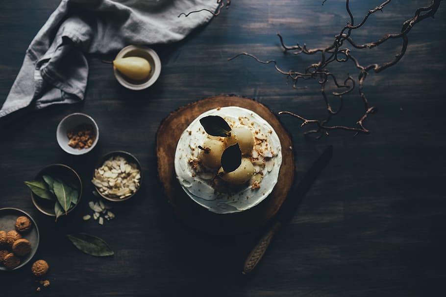 cupcake with nuts and leaves on black table, pears, decoration HD wallpaper