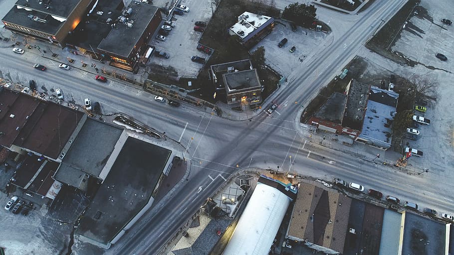 aerial view of intersection during daytime, aerial photography of cityscape HD wallpaper