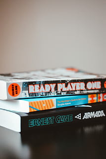close up photo of several books, assorted books, stack, ready player one HD wallpaper