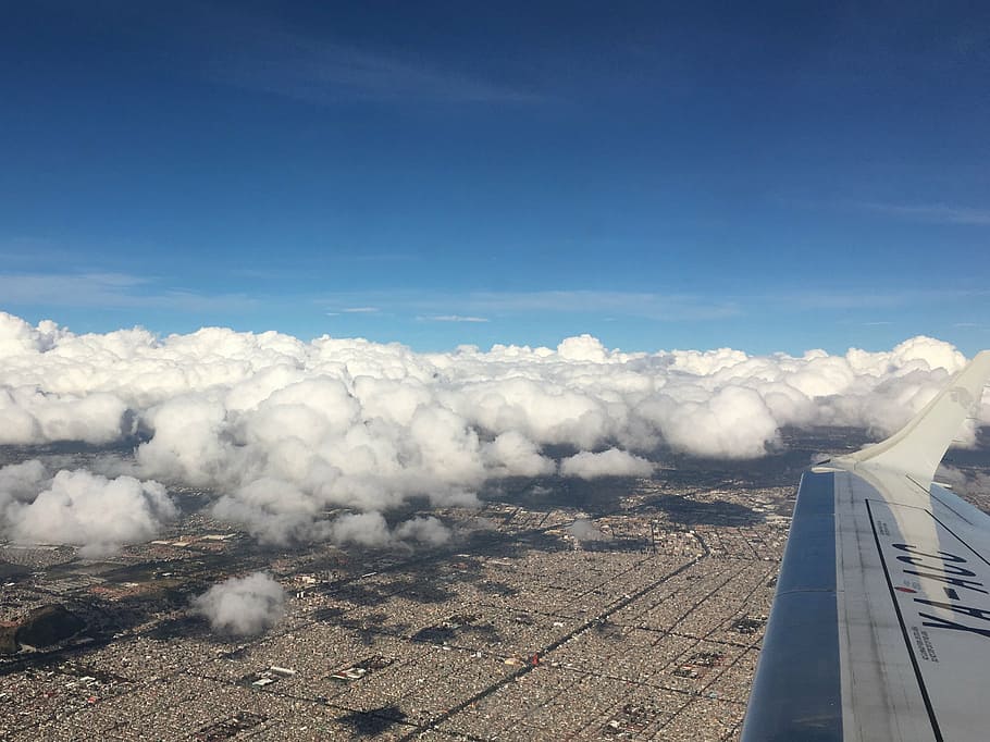 cloud over city, flight, wing, sky, plane, travel, fly, air HD wallpaper