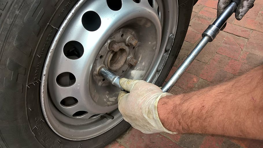 gray 5-lug vehicle wheel and tire, breakdown, auto, flat tire