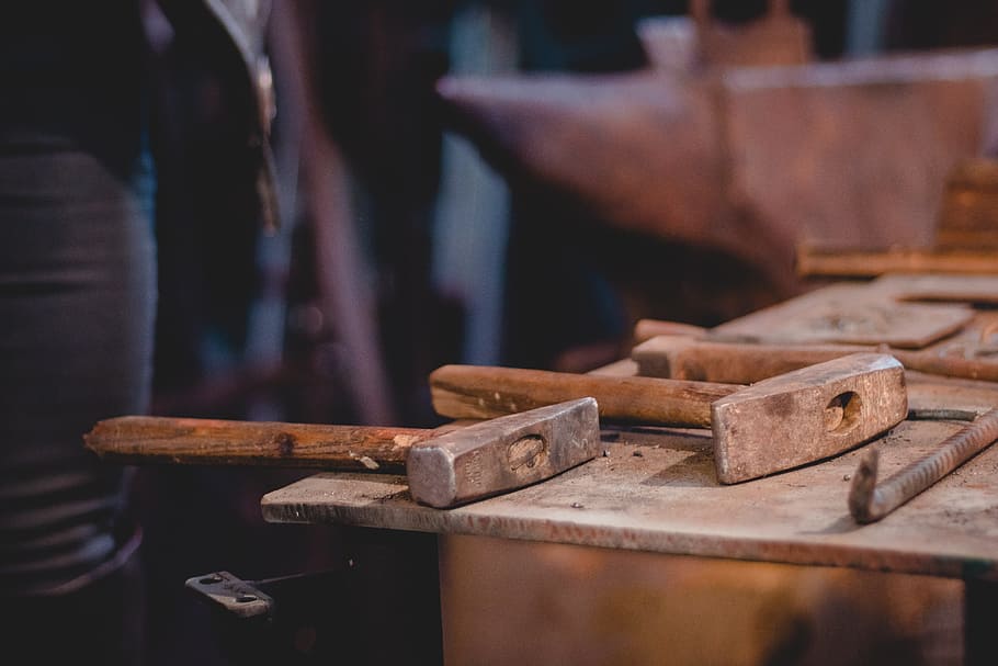 brown wooden handled hammer on brown table, old, forge, industry HD wallpaper