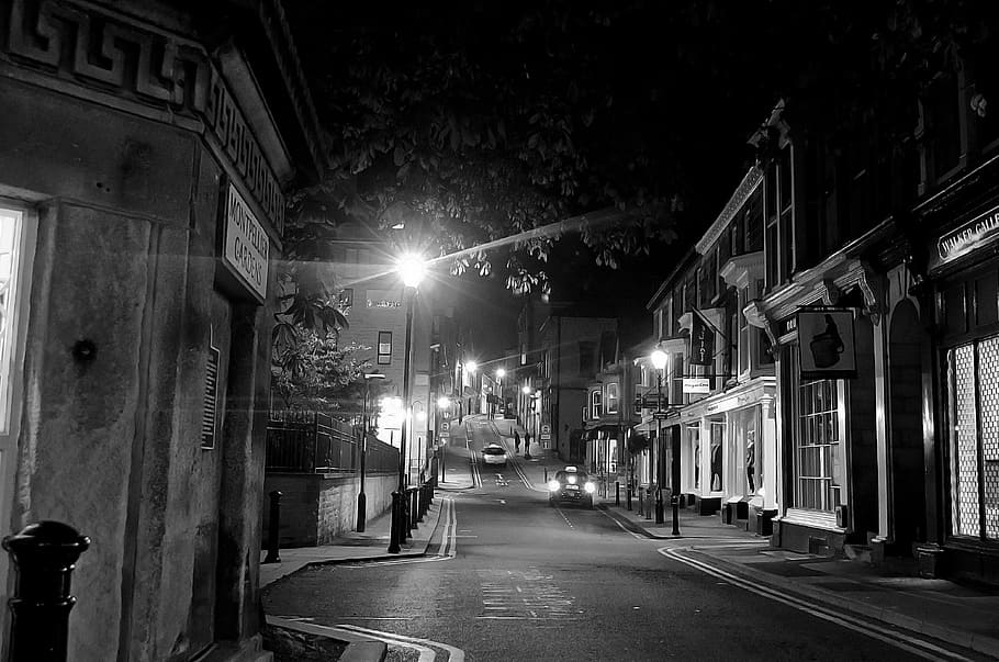 greyscale photography of street, sleeping, city, night, evening HD wallpaper