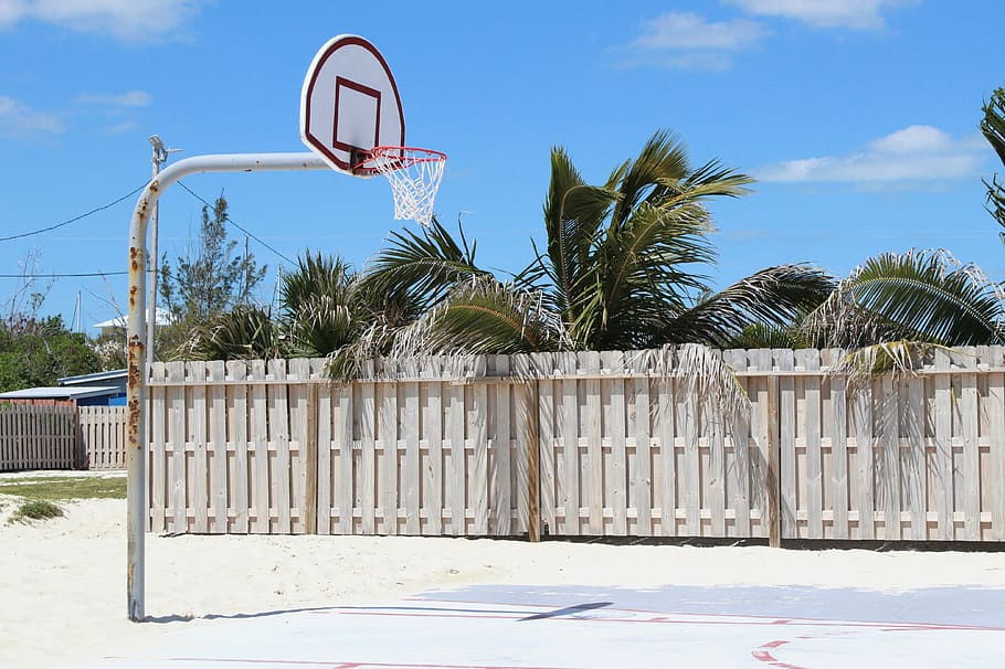 red and white basketball system, gray and black standalone basketball