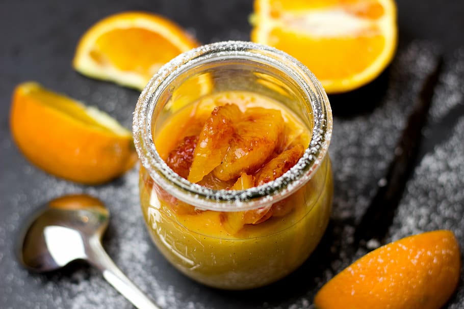 orange marmalade in jar beside spoon, orange pudding, oranges HD wallpaper