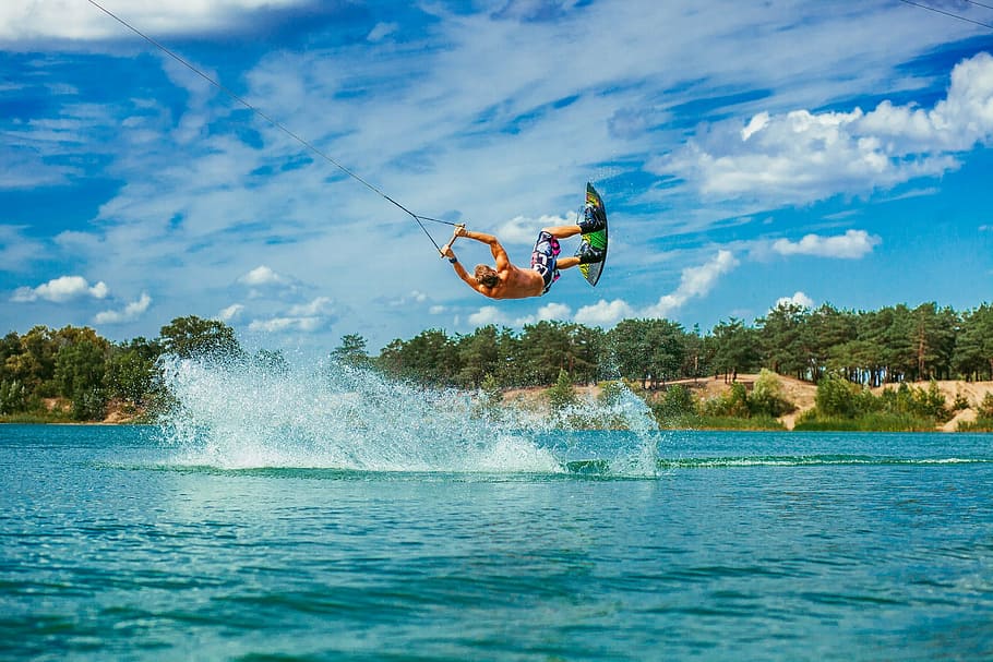 man parasailing on body of water, small river, vacation, surfing HD wallpaper