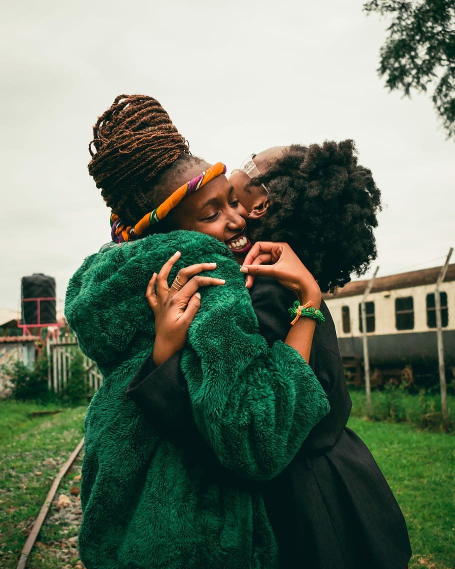 Free Download Hd Wallpaper Two Women Hugging During Day Time Two Women Hugging Each Other 