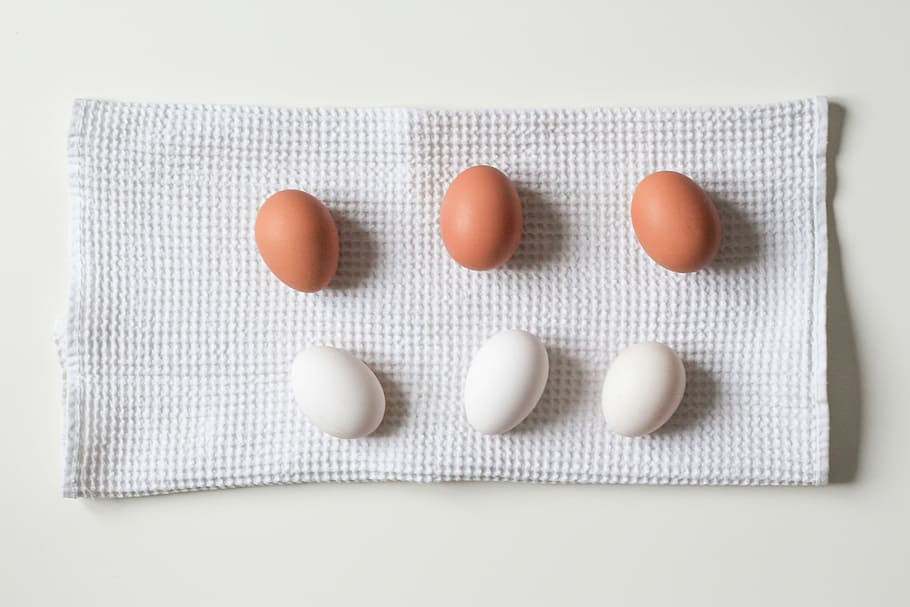 six white and brown eggs on white towel, three brown and three white poultry eggs HD wallpaper
