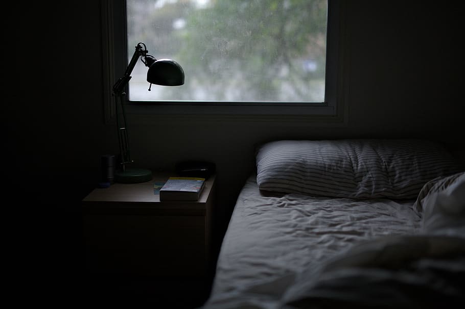 photo of bed near task lamp, Soft and Warm, room, bedroom, cosy