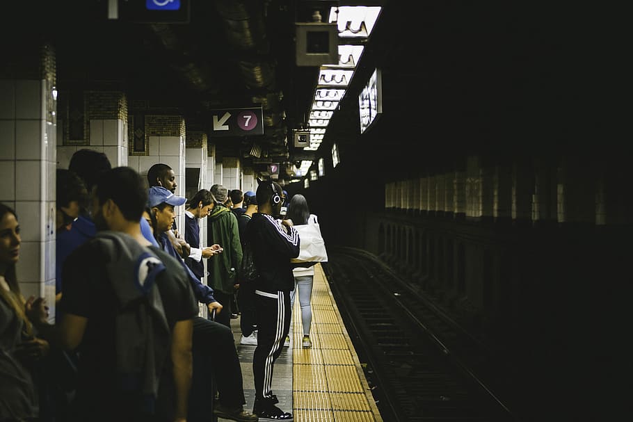 people standing in train station tunnel, people standing inside a train station HD wallpaper