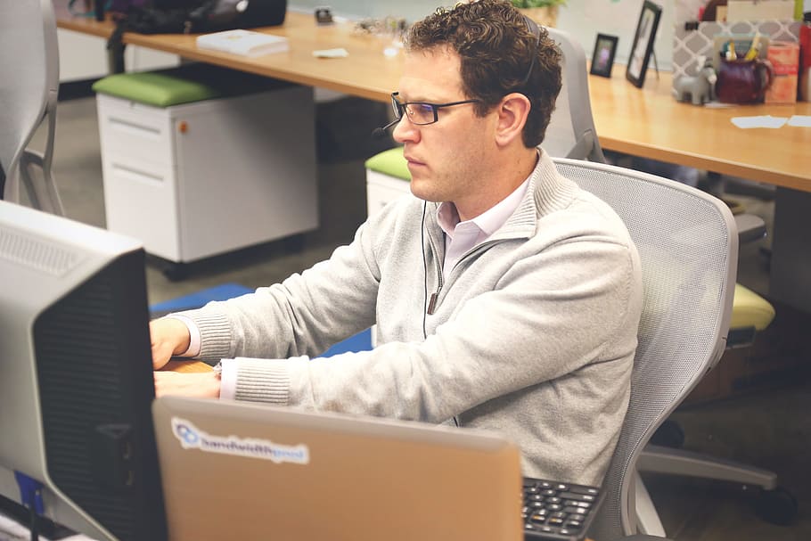 man in gray half-zip jacket work with computer, startup, start-up HD wallpaper
