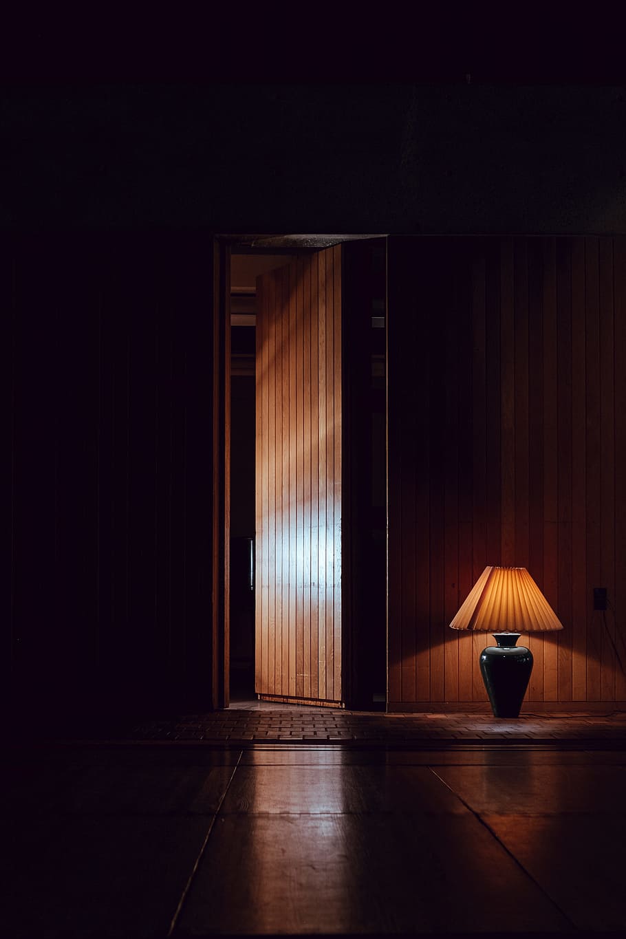 Gateway, black ceramic table lamp with brown shade, indoors, flooring
