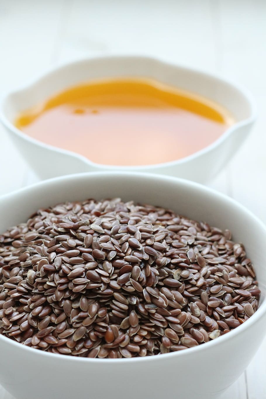 brown beans and orange liquid on white ceramic bowl, linseed, HD wallpaper