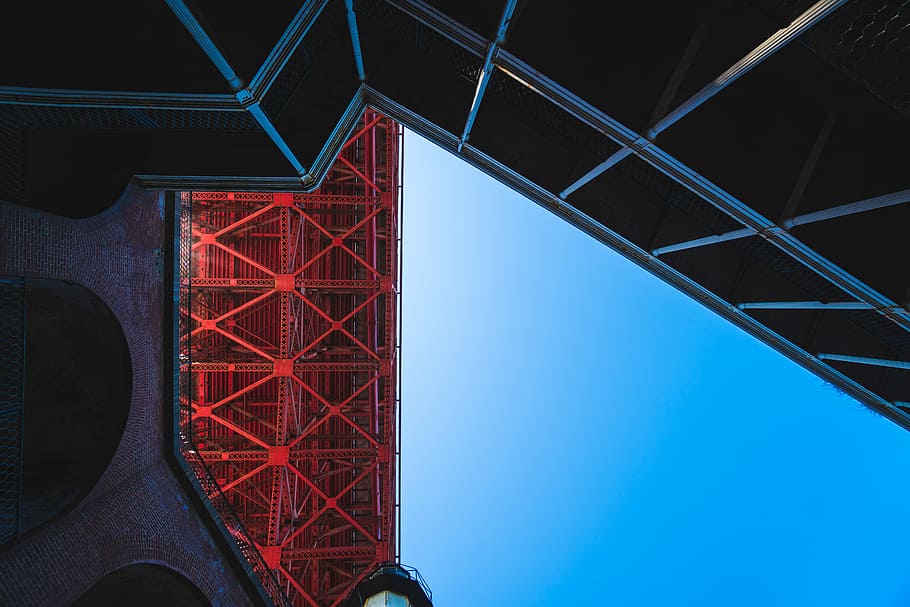 red metal trusses taken at daytime, low-angle photography of building HD wallpaper