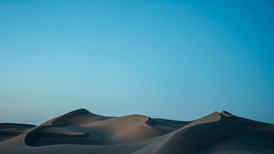 desert under blue sky, photo of brown rocky sand during daytime HD wallpaper