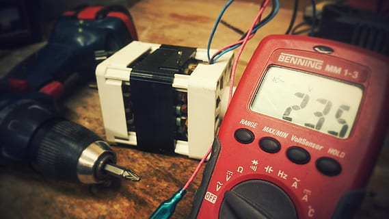 close-up photo of red Benning MM 1-3 multimeter at 235, electric HD wallpaper