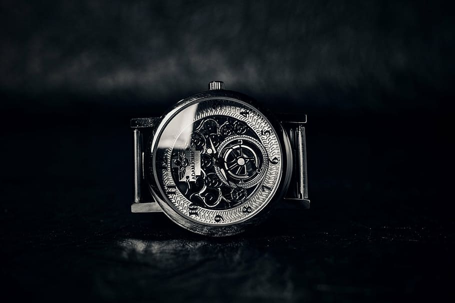 round silver-colored skeleton watch on black surface, time, clock, HD wallpaper
