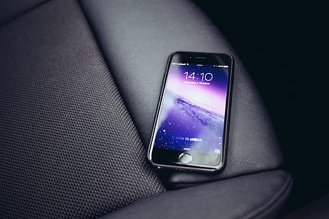 black iPhone 7 on black leather textile turn on, device, tablet HD wallpaper
