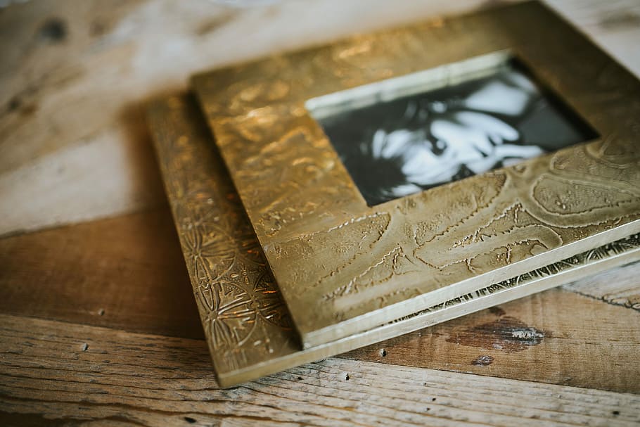 Golden photo frame and decorative paper on a table, decoration, HD wallpaper