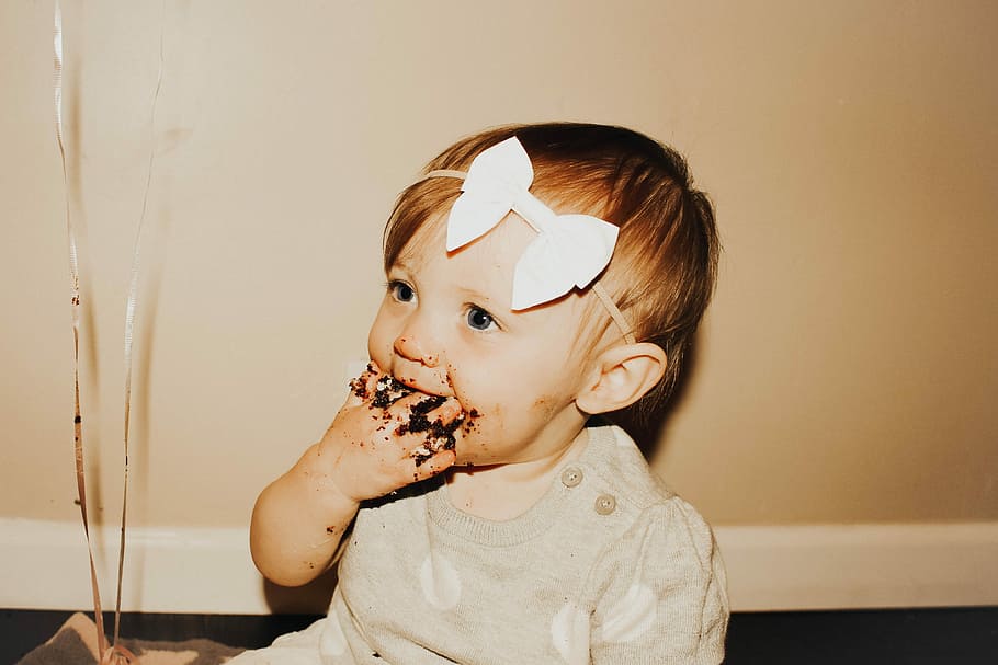 baby eating chocolate wallpaper