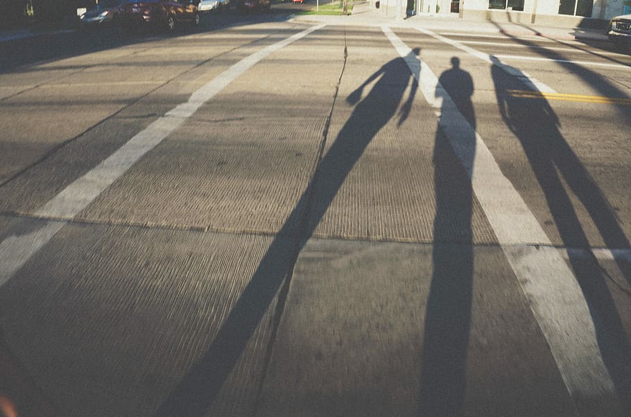 three shadow of persons on gray concrete pavement, three people standing on concrete pavement, HD wallpaper