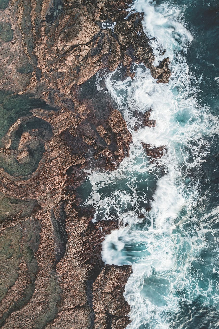 brown mountain near body of water, brown shore and waves, sea HD wallpaper