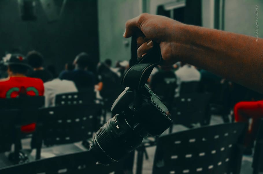 person holding black DSLR camera, person holding DSLR camera HD wallpaper