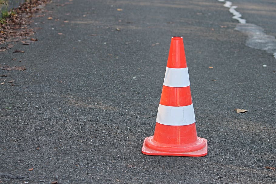 orange and white traffic cone, pylon, barrier, road sign, lock