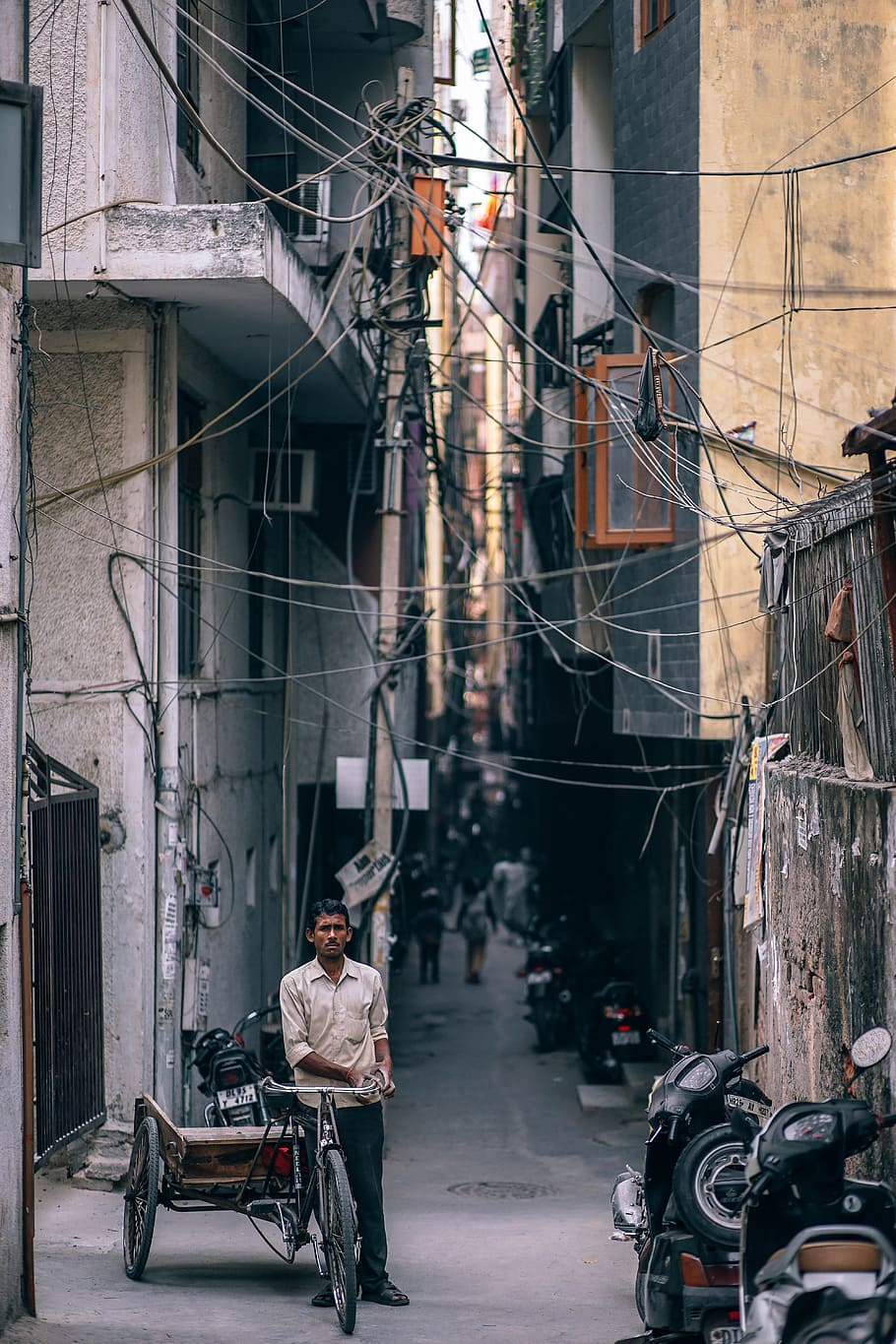 man leaning on trike under electricity cables, asia, asian, bazaar, HD wallpaper