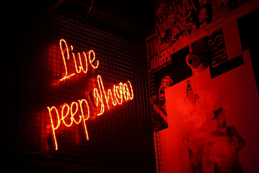 Live Peep Show neon signage, Live Peep Show neon sign on dark wall