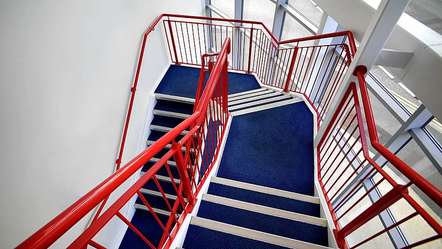 red steel railings, stairs, stairwell, stairway, staircase, construction