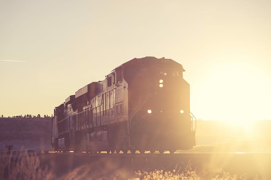 silhouette photo of black train on rail, black train in sunset HD wallpaper