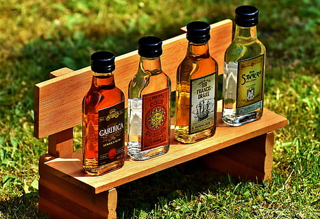 four glass bottles, Rum, Alcohol, Origin, different origin HD wallpaper