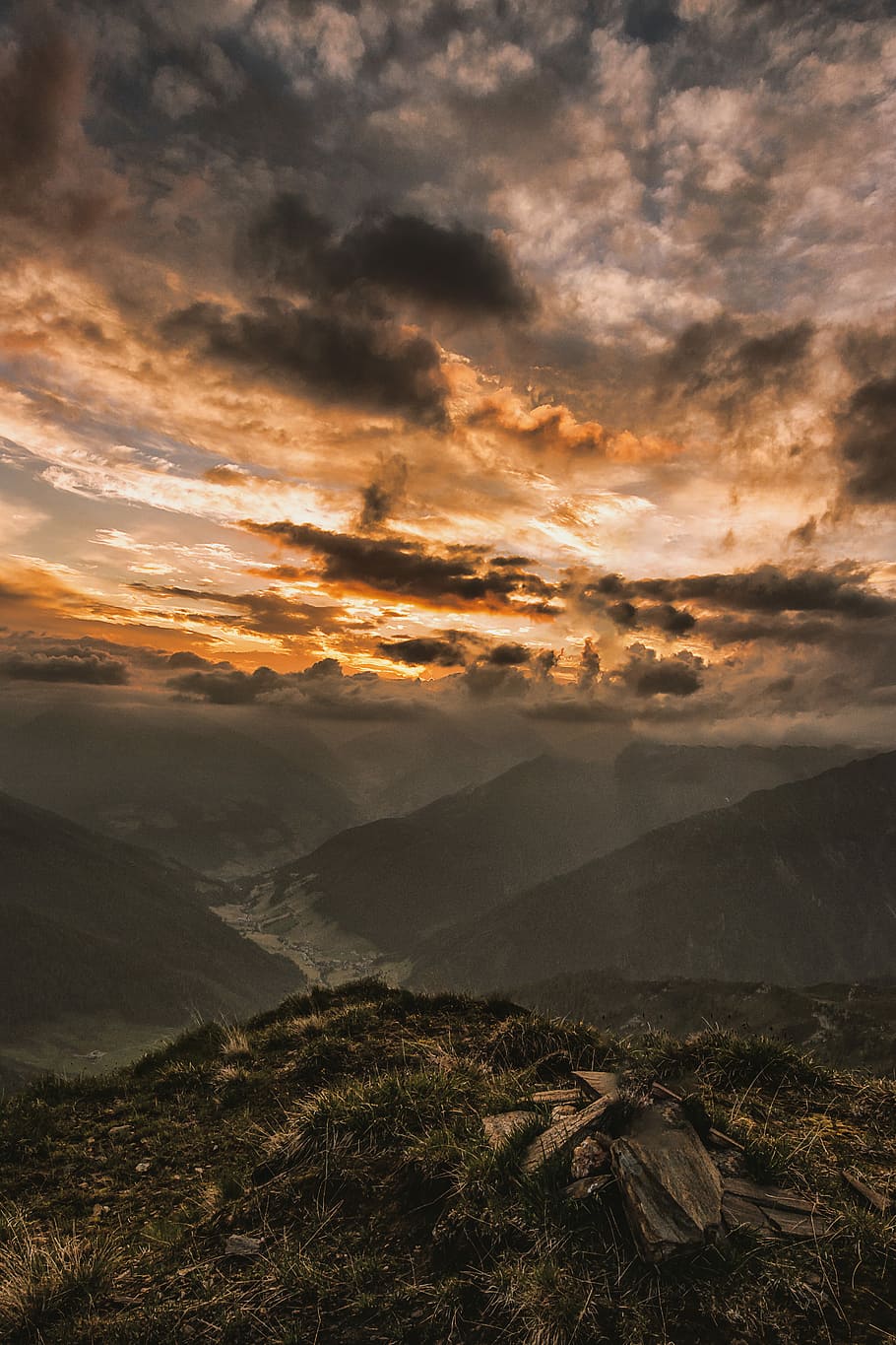 green mountains under cloudy sky at daytime, mountains under black and white cloudy sky and sunset HD wallpaper