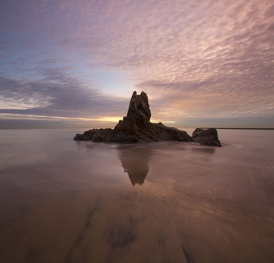 rock formation surrounded by water, rock formation at the middle of the ocean HD wallpaper