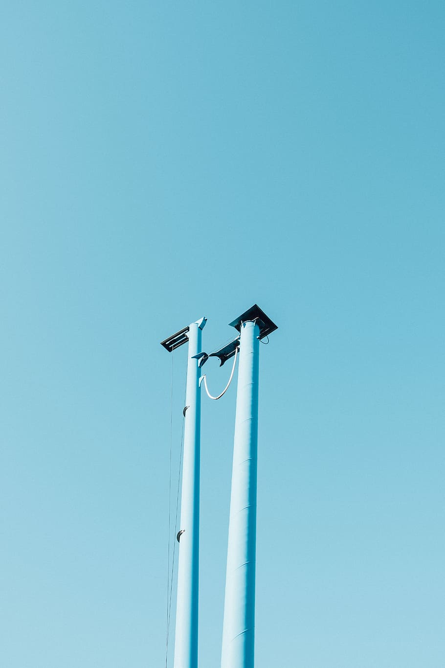 two white concrete posts photography, two pole with pad on top HD wallpaper