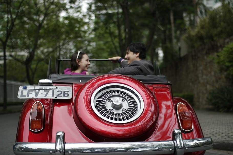 couple riding classic red convertible coupe during daytime, old timer, HD wallpaper