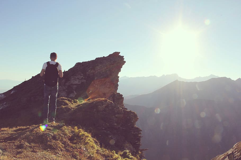 man carrying black backpack, male, mountain, backback, bag HD wallpaper