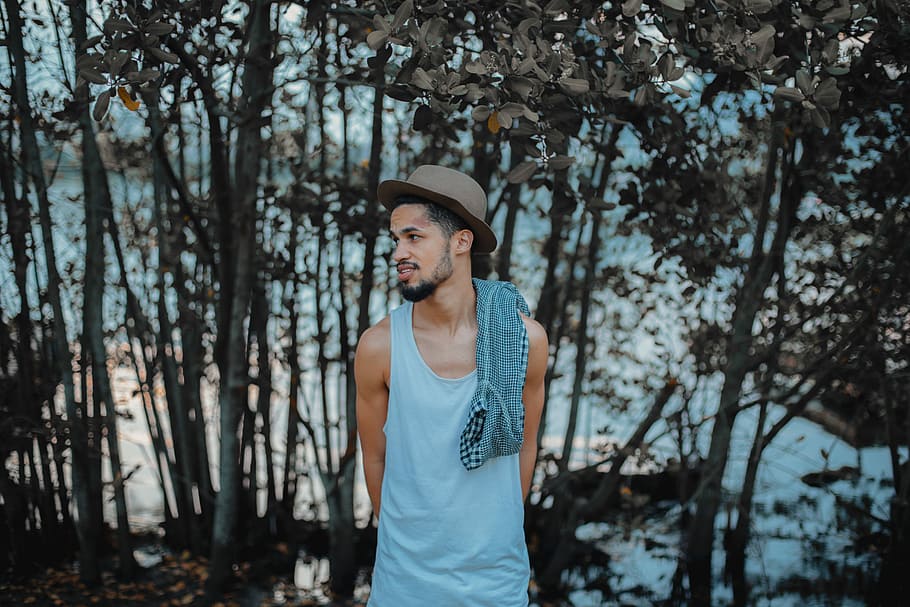 man standing behind body of water, man standing near trees and body of water HD wallpaper