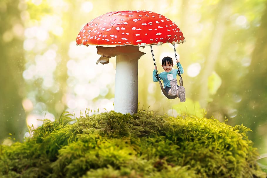 child riding on swing mushroom, fantasy, girl, moss, bokeh, fly agaric