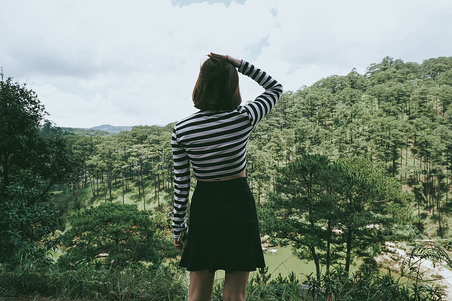 Woman standing and enjoying the scenery in Vietnam, people, girl